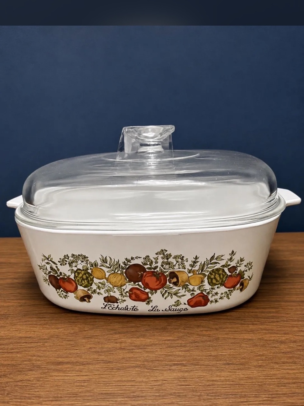 Corningware White Casserole with Red, Green, Brown Vegetable Motif and Clear Lid